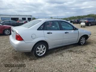 ✅ 2005 Ford Focus S • VIN: 1FAFP34N35W232261 • Lot: 85916965. Wystawiony na Copart z przebiegiem 105 409 mil. Bezpłatny archiwum sprzedaży aukcyjnych z USA i szczegółowy raport historii pojazdu na DreamBid. Zdjęcie 3.