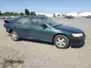 2000 Honda Accord EX with VIN JHMCG6675YC037201, listed as a Copart auction lot 59120345 with 202,552 mi miles and Salvage title. Bid and sale history available at DreamBid. Image 4.