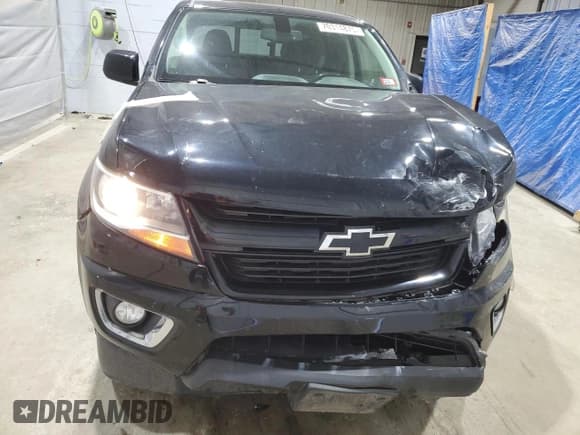 ✅ 2016 Chevrolet Colorado 4WD Z71 • VIN: 1GCGTDE38G1357317 • Лот: 70314875. Опубликован ранее на Copart с пробегом 194 086 миль. Бесплатный доступ к архиву аукционных продаж из США и подробный отчёт об истории автомобиля на DreamBid. Изображение 5.