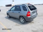 ✅ 2006 Kia Sportage LX • VIN: KNDJF724867286014 • Лот: 42411762. Опубликован ранее на IAAI с пробегом 260 946 миль. Бесплатный доступ к архиву аукционных продаж из США и подробный отчёт об истории автомобиля на DreamBid. Изображение 3.