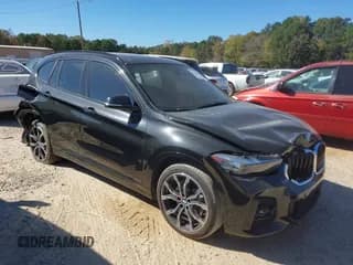✅ 2021 BMW X1 xDrive28i • VIN: WBXJG9C0XM5U28881 • Lot: 43518155. Listed on IAAI with 27,307 mi. Free auction sales archive from the USA and detailed vehicle history report at DreamBid. Image 1.