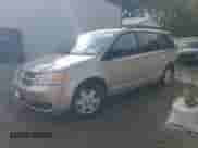 2009 Dodge Grand Caravan SE with VIN 2D8HN44E79R651812, listed as a Copart auction lot 85851955 with 253,916 mi miles and Salvage title. Bid and sale history available at DreamBid. Image 1.