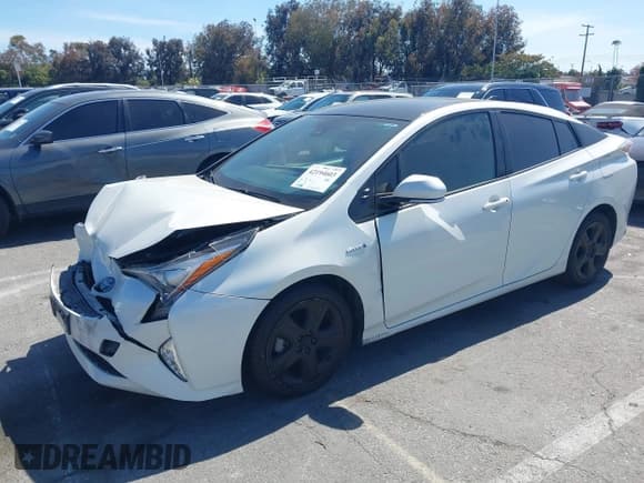 ✅ 2016 Toyota Prius Four • VIN: JTDKARFU5G3019382 • Лот: 42645532. Опубликован ранее на IAAI с пробегом 153 414 миль. Бесплатный доступ к архиву аукционных продаж из США и подробный отчёт об истории автомобиля на DreamBid. Изображение 2.
