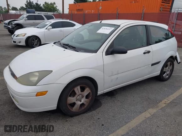 ✅ 2003 Ford Focus ZX3 • VIN: 3FAFP31Z23R147547 • Lot: 42426117. Listed on IAAI with 129,860 mi. Free auction sales archive from the USA and detailed vehicle history report at DreamBid. Image 2.