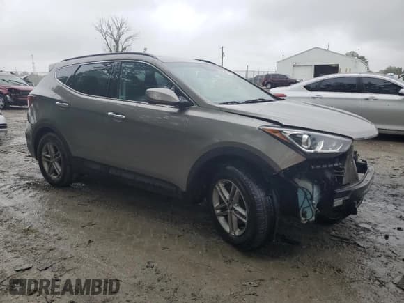 ✅ 2017 Hyundai Santa Fe 2.4L • VIN: 5NMZU3LB8HH032409 • Lot: 57939915. Listed on Copart with 105,494 mi. Free auction sales archive from the USA and detailed vehicle history report at DreamBid. Image 4.