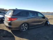 ✅ 2019 Honda Odyssey Elite • VIN: 5FNRL6H90KB004882 • Lot: 92391055. Listed on Copart with 60,951 mi. Free auction sales archive from the USA and detailed vehicle history report at DreamBid. Image 3.