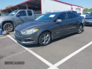 ✅ 2015 Ford Fusion Titanium Hybrid • VIN: 3FA6P0RU4FR292892 • Лот: 43271541. Опубликован ранее на IAAI с пробегом 260 001 миль. Бесплатный доступ к архиву аукционных продаж из США и подробный отчёт об истории автомобиля на DreamBid. Изображение 17.