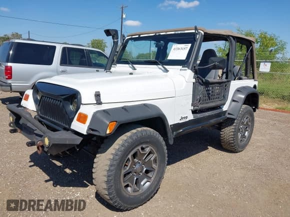 ✅ 2000 Jeep Wrangler Sahara • VIN: 1J4FA59S6YP700675 • Лот: 43363157. Опубликован ранее на IAAI с пробегом 156 158 миль. Бесплатный доступ к архиву аукционных продаж из США и подробный отчёт об истории автомобиля на DreamBid. Изображение 2.