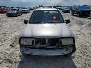 2002 Chevrolet Tracker с VIN 2CNBE13C826912290, выставлен на аукционе Copart как лот 69659335 с пробегом 153 495 миль миль и Списание • Salvage title. История ставок и продаж доступна на DreamBid. Изображение 5.