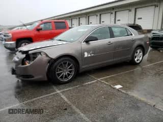 ✅ 2010 Chevrolet Malibu 1LS • VIN: 1G1ZB5EB0AF145796 • Lot: 85176065. Listed on Copart with 145,894 mi. Free auction sales archive from the USA and detailed vehicle history report at DreamBid. Image 1.
