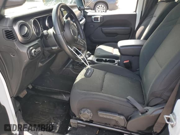 ✅ 2021 Jeep Wrangler Sport • VIN: 1C4GJXANXMW827523 • Lot: 59334145. Wystawiony na Copart z przebiegiem 21 031 mil. Bezpłatny archiwum sprzedaży aukcyjnych z USA i szczegółowy raport historii pojazdu na DreamBid. Zdjęcie 7.