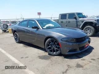 2022 Dodge Charger SXT with VIN 2C3CDXBG3NH192929, listed as a IAAI auction lot 42713432 with 29,792 mi miles and . Bid and sale history available at DreamBid. Image 1.