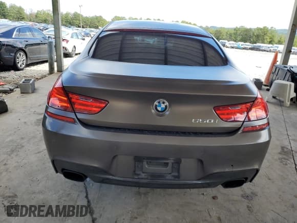 ✅ 2015 BMW 6 Series 650i • VIN: WBA6B2C51FGB99101 • Lot: 81861485. Wystawiony na Copart z przebiegiem 124 292 mil. Bezpłatny archiwum sprzedaży aukcyjnych z USA i szczegółowy raport historii pojazdu na DreamBid. Zdjęcie 6.