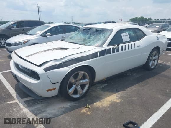 ✅ 2013 Dodge Challenger SXT • VIN: 2C3CDYAG1DH653521 • Lot: 42400304. Wystawiony na IAAI z przebiegiem 234 261 mil. Bezpłatny archiwum sprzedaży aukcyjnych z USA i szczegółowy raport historii pojazdu na DreamBid. Zdjęcie 2.