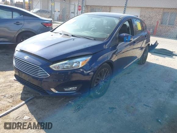✅ 2016 Ford Focus Titanium • VIN: 1FADP3N21GL405372 • Lot: 43574471. Listed on IAAI with 126,000 mi. Free auction sales archive from the USA and detailed vehicle history report at DreamBid. Image 2.