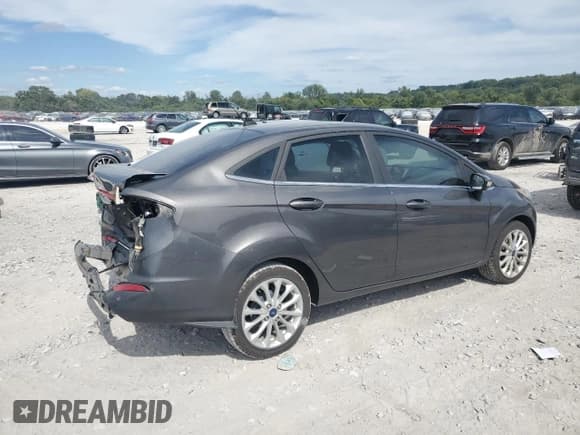 ✅ 2018 Ford Fiesta Titanium • VIN: 3FADP4CJ1JM109757 • Lot: 70323385. Listed on Copart with 40,404 mi. Free auction sales archive from the USA and detailed vehicle history report at DreamBid. Image 3.