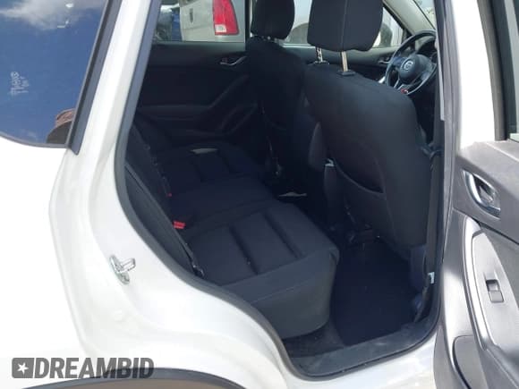 ✅ 2016 Mazda CX-5 Touring • VIN: JM3KE2CY0G0694939 • Lot: 43401057. Wystawiony na IAAI z przebiegiem 125 867 mil. Bezpłatny archiwum sprzedaży aukcyjnych z USA i szczegółowy raport historii pojazdu na DreamBid. Zdjęcie 8.