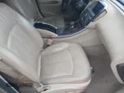 ✅ 2013 Buick LaCrosse Leather • VIN: 1G4GC5ER0DF200255 • Lot: 41609420. Listed on IAAI with 182,421 mi. Free auction sales archive from the USA and detailed vehicle history report at DreamBid. Image 5.