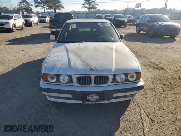 ✅ 1995 BMW 5 Series 525i • VIN: WBAHD5329SGB39457 • Lot: 84928964. Listed on Copart with 136,095 mi. Free auction sales archive from the USA and detailed vehicle history report at DreamBid. Image 5.
