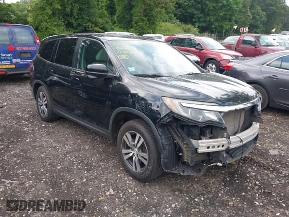 ✅ 2017 Honda Pilot EX-L • VIN: 5FNYF6H56HB048961 • Lot: 42664011. Listed on IAAI with 210,063 mi. Free auction sales archive from the USA and detailed vehicle history report at DreamBid. Image 1.