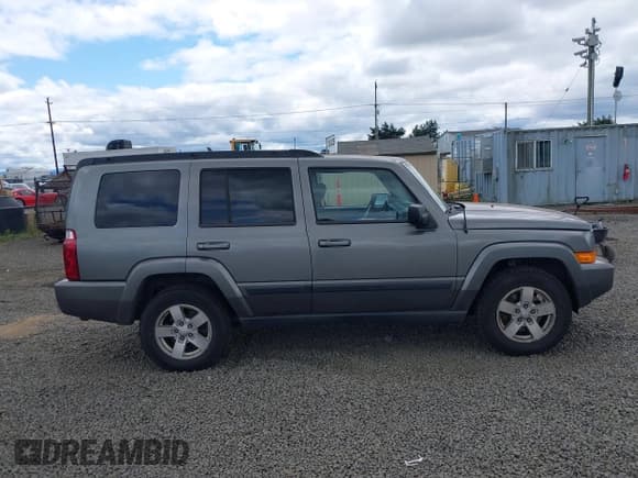 ✅ 2007 Jeep Commander Sport • VIN: 1J8HG48P27C589142 • Lot: 42379721. Listed on IAAI with 162,397 mi. Free auction sales archive from the USA and detailed vehicle history report at DreamBid. Image 13.