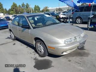 ✅ 1999 Saturn SL • VIN: 1G8ZK5277XZ135985 • Lot: 43502509. Wystawiony na IAAI z przebiegiem 136 712 mil. Bezpłatny archiwum sprzedaży aukcyjnych z USA i szczegółowy raport historii pojazdu na DreamBid. Zdjęcie 1.