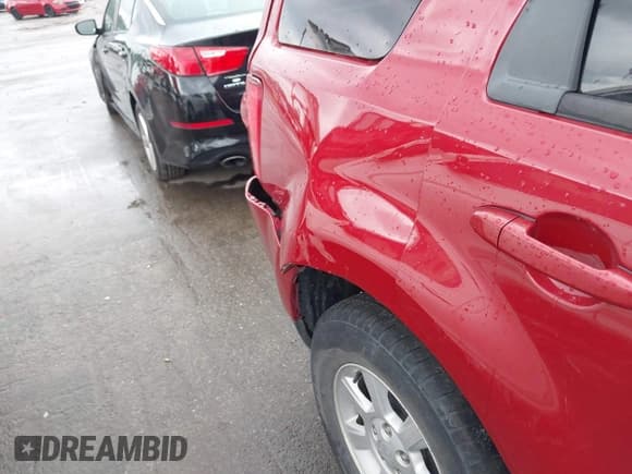 ✅ 2011 Mazda Tribute Grand Touring • VIN: 4F2CY9GG3BKM00770 • Lot: 42873377. Listed on IAAI with 131,821 mi. Free auction sales archive from the USA and detailed vehicle history report at DreamBid. Image 12.