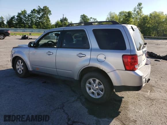 ✅ 2011 Mazda Tribute Grand Touring • VIN: 4F2CY9GG3BKM02499 • Lot: 57778865. Listed on Copart with 148,502 mi. Free auction sales archive from the USA and detailed vehicle history report at DreamBid. Image 2.