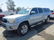 ✅ 2015 Toyota Tacoma PreRunner • VIN: 3TMKU4HN9FM045948 • Lot: 42575327. Listed on IAAI with 67,971 mi. Free auction sales archive from the USA and detailed vehicle history report at DreamBid. Image 4.