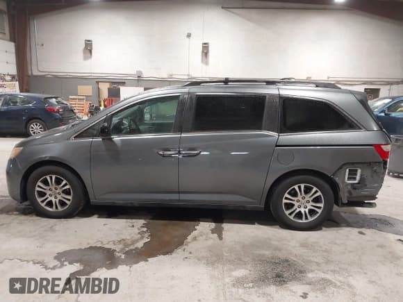 ✅ 2012 Honda Odyssey EX-L • VIN: 5FNRL5H67CB100705 • Lot: 43821207. Listed on IAAI with 105,432 mi. Free auction sales archive from the USA and detailed vehicle history report at DreamBid. Image 14.