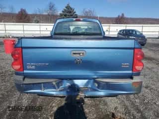 2005 Dodge Dakota SLT с VIN 1D7HW42N95S102352, выставлен на аукционе Copart как лот 80290684 с пробегом 106 205 миль миль и Списание • Salvage title. История ставок и продаж доступна на DreamBid. Изображение 6.