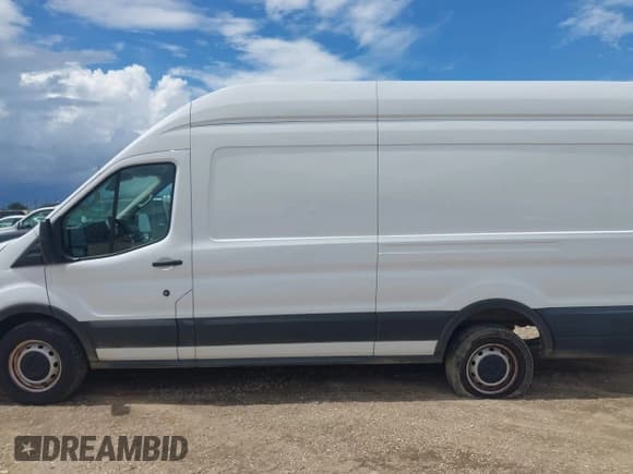 ✅ 2023 Ford Transit Cargo • VIN: 1FTBR3X83PKA70005 • Lot: 42949959. Listed on IAAI with 53,215 mi. Free auction sales archive from the USA and detailed vehicle history report at DreamBid. Image 14.