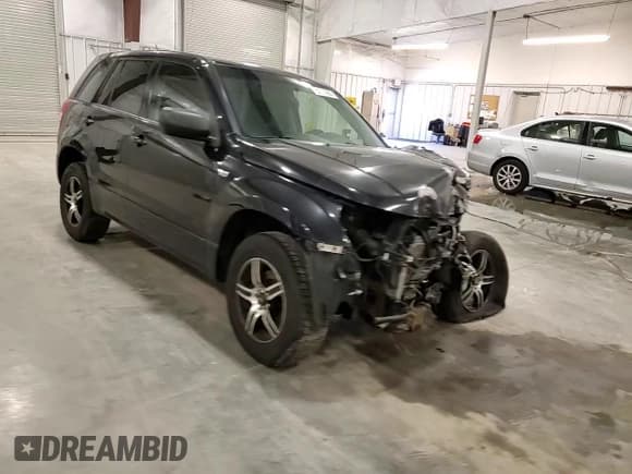 ✅ 2007 Suzuki Grand Vitara • VIN: JS3TD941474205088 • Lot: 55231965. Wystawiony na Copart z przebiegiem 164 494 mil. Bezpłatny archiwum sprzedaży aukcyjnych z USA i szczegółowy raport historii pojazdu na DreamBid. Zdjęcie 15.