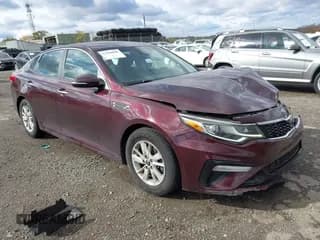 ✅ 2019 Kia Optima LX • VIN: 5XXGT4L35KG281278 • Лот: 43584008. Опубликован ранее на IAAI с пробегом 147 097 миль. Бесплатный доступ к архиву аукционных продаж из США и подробный отчёт об истории автомобиля на DreamBid. Изображение 1.