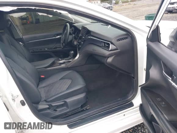 2023 Toyota Camry SE with VIN 4T1G11BKXPU103277, listed as a IAAI auction lot 41978396 with 66,624 mi miles and . Bid and sale history available at DreamBid. Image 5.