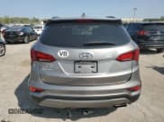 ✅ 2017 Hyundai Santa Fe 2.4L • VIN: 5NMZUDLB2HH028894 • Лот: 70141974. Опубликован ранее на Copart с пробегом 124 839 миль. Бесплатный доступ к архиву аукционных продаж из США и подробный отчёт об истории автомобиля на DreamBid. Изображение 6.