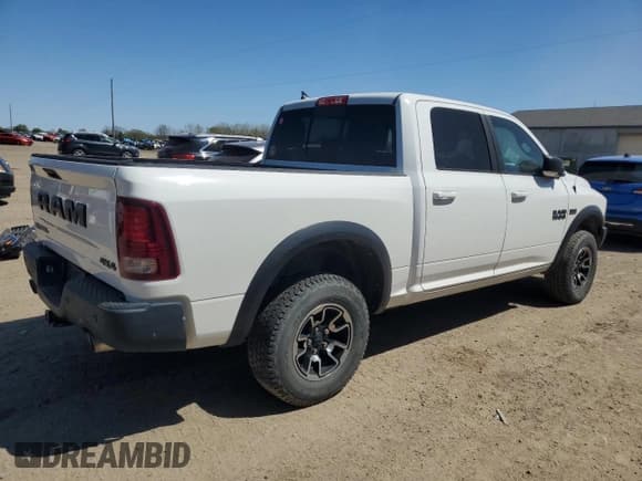 ✅ 2017 Ram 1500 Rebel • VIN: 1C6RR7YT7HS858318 • Lot: 56338085. Listed on Copart with 143,301 mi. Free auction sales archive from the USA and detailed vehicle history report at DreamBid. Image 3.