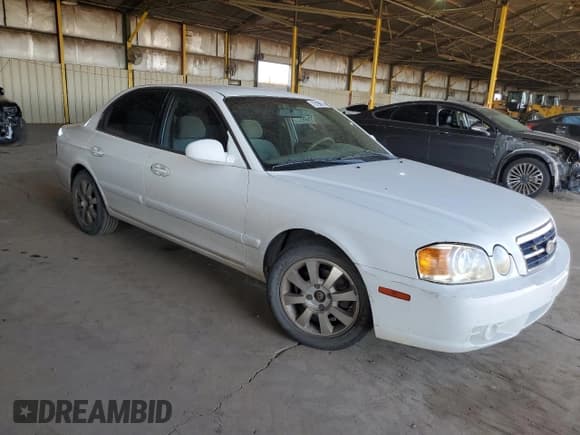 ✅ 2004 Kia Optima LX • VIN: KNAGD128345260815 • Лот: 78198574. Опубликован ранее на Copart с пробегом 210 884 миль. Бесплатный доступ к архиву аукционных продаж из США и подробный отчёт об истории автомобиля на DreamBid. Изображение 4.