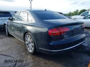 ✅ 2015 Audi A8 4.0T • VIN: WAU32AFD6FN022648 • Лот: 42358142. Опубликован ранее на IAAI с пробегом 103 416 миль. Бесплатный доступ к архиву аукционных продаж из США и подробный отчёт об истории автомобиля на DreamBid. Изображение 3.