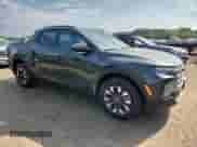 2025 Hyundai Santa Cruz SEL with VIN 5NTJBDDE2SH137296, listed as a Copart auction lot 68018035 with 4,676 mi miles and Salvage title. Bid and sale history available at DreamBid. Image 4.