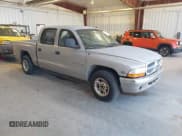 ✅ 2000 Dodge Dakota Sport • VIN: 1B7GL2AX9YS646909 • Lot: 42967254. Listed on IAAI with 251,189 mi. Free auction sales archive from the USA and detailed vehicle history report at DreamBid. Image 1.