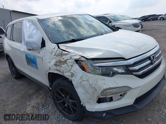 ✅ 2018 Honda Pilot EX-L • VIN: 5FNYF6H52JB063429 • Lot: 42285436. Listed on IAAI with 89,429 mi. Free auction sales archive from the USA and detailed vehicle history report at DreamBid. Image 6.