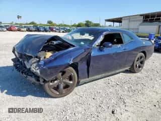 2013 Dodge Challenger SXT z VIN 2C3CDYAG6DH663428, wystawiony jako Copart lot #82074155 z przebiegiem 144 060 mil mil oraz Szkoda całkowita • Salvage title. Historia ofert i sprzedaży dostępna na DreamBid. Obrazek 1.