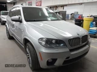 ✅ 2013 BMW X5 xDrive50i • VIN: 5UXZV8C59DL892556 • Lot: 43844236. Listed on IAAI with 95,967 mi. Free auction sales archive from the USA and detailed vehicle history report at DreamBid. Image 1.