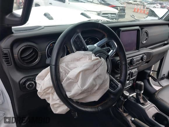 ✅ 2021 Jeep Wrangler Unlimited Sahara • VIN: 1C4HJXEG1MW597127 • Lot: 43354032. Listed on IAAI with 82,436 mi. Free auction sales archive from the USA and detailed vehicle history report at DreamBid. Image 18.