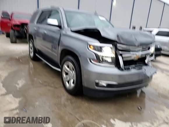 2020 Chevrolet Tahoe Premier with VIN 1GNSKCKC4LR106373, listed as a Copart auction lot 47627615 with 100,511 mi miles and Salvage title. Bid and sale history available at DreamBid. Image 14.