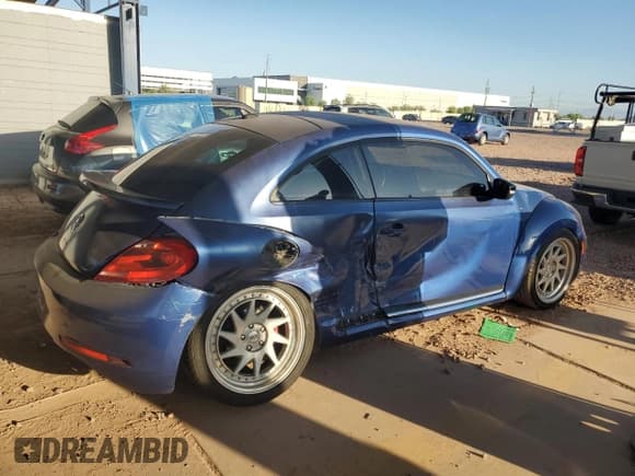 ✅ 2014 Volkswagen Beetle Turbo R-Line • VIN: 3VWVT7AT8EM621762 • Lot: 61234575. Listed on Copart with 97,065 mi. Free auction sales archive from the USA and detailed vehicle history report at DreamBid. Image 3.