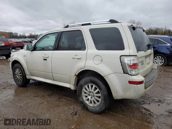 2009 Mercury Mariner Premier with VIN 4M2CU97759KJ15746, listed as a Copart auction lot 83802964 with 180,342 mi miles and Salvage title. Bid and sale history available at DreamBid. Image 2.