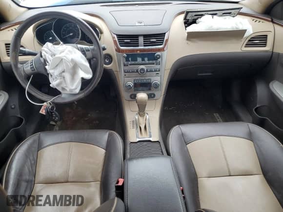 2012 Chevrolet Malibu LTZ 1LZ with VIN 1G1ZE5E05CF248267, listed as a Copart auction lot 82221295 with 129,342 mi miles and Salvage title. Bid and sale history available at DreamBid. Image 8.