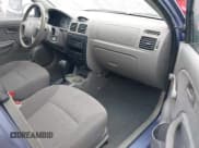 ✅ 2003 Kia Rio • VIN: KNADC125736223027 • Lot: 41797538. Listed on IAAI with 25,611 mi. Free auction sales archive from the USA and detailed vehicle history report at DreamBid. Image 5.